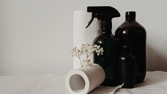 Amber glass spray bottle and castile soap in bottle for handmade cleaning surface sprays