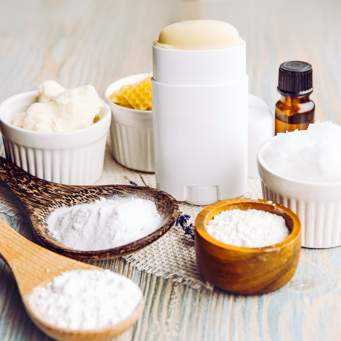 Bicarb soda and various ingredients in a bowl to make natural deodorant, 