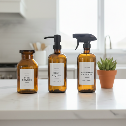 Three bottles of kitchen cleaning products with labels on a white background