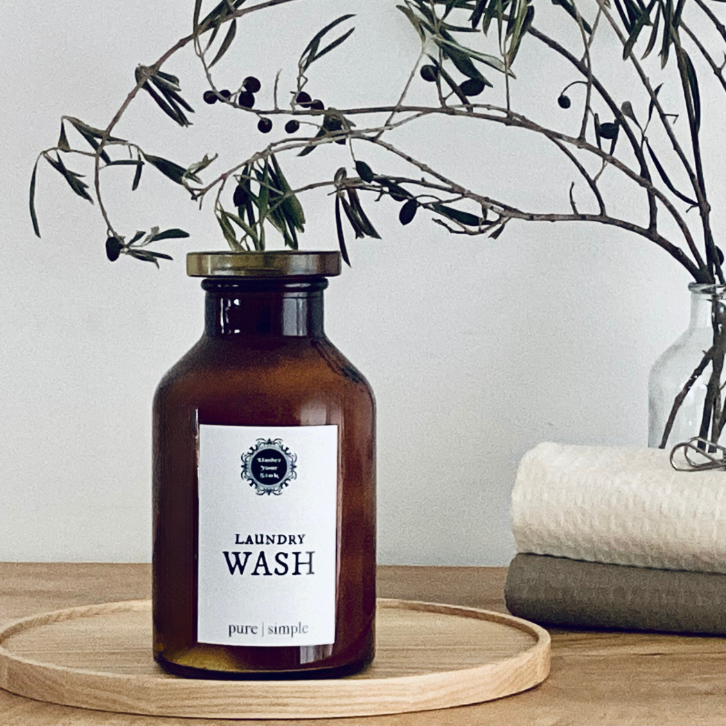 Handmade laundry washing powder for sale in stylish amber glass jar  for natural zero waste cleaning